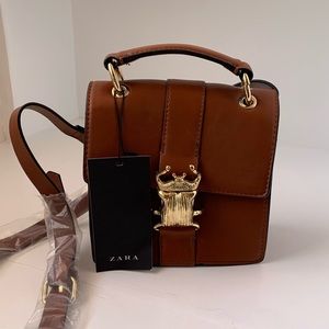 Zara handbag with golden beetle clasp